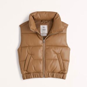 Mini puffer vest. Perfect condition, no damage. Worn only 3 times